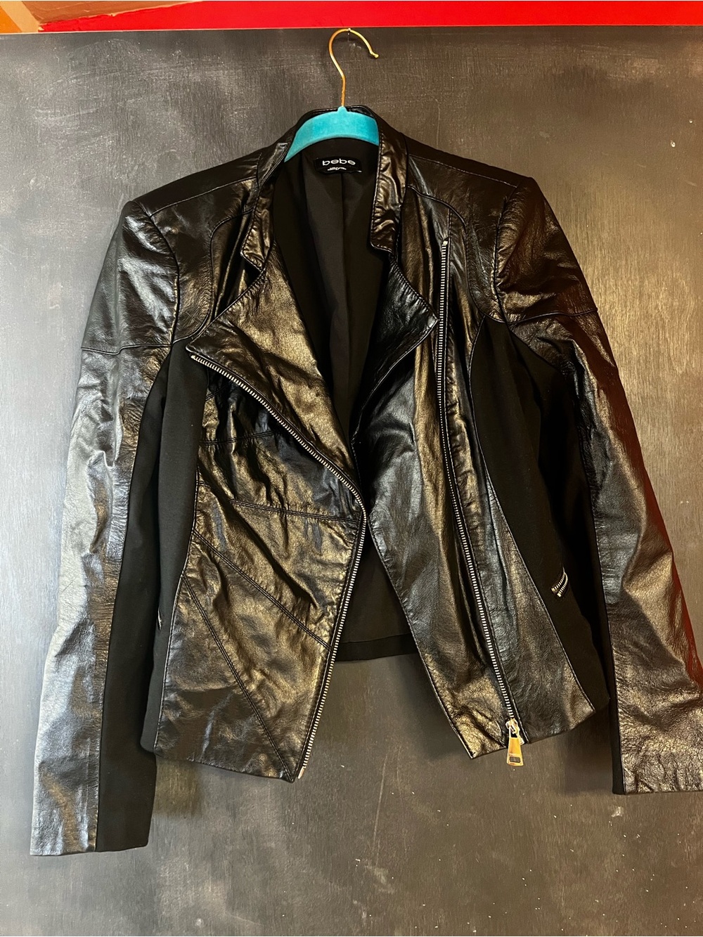 bebe Black Faux Leather Moto Jacket with Panel Accents